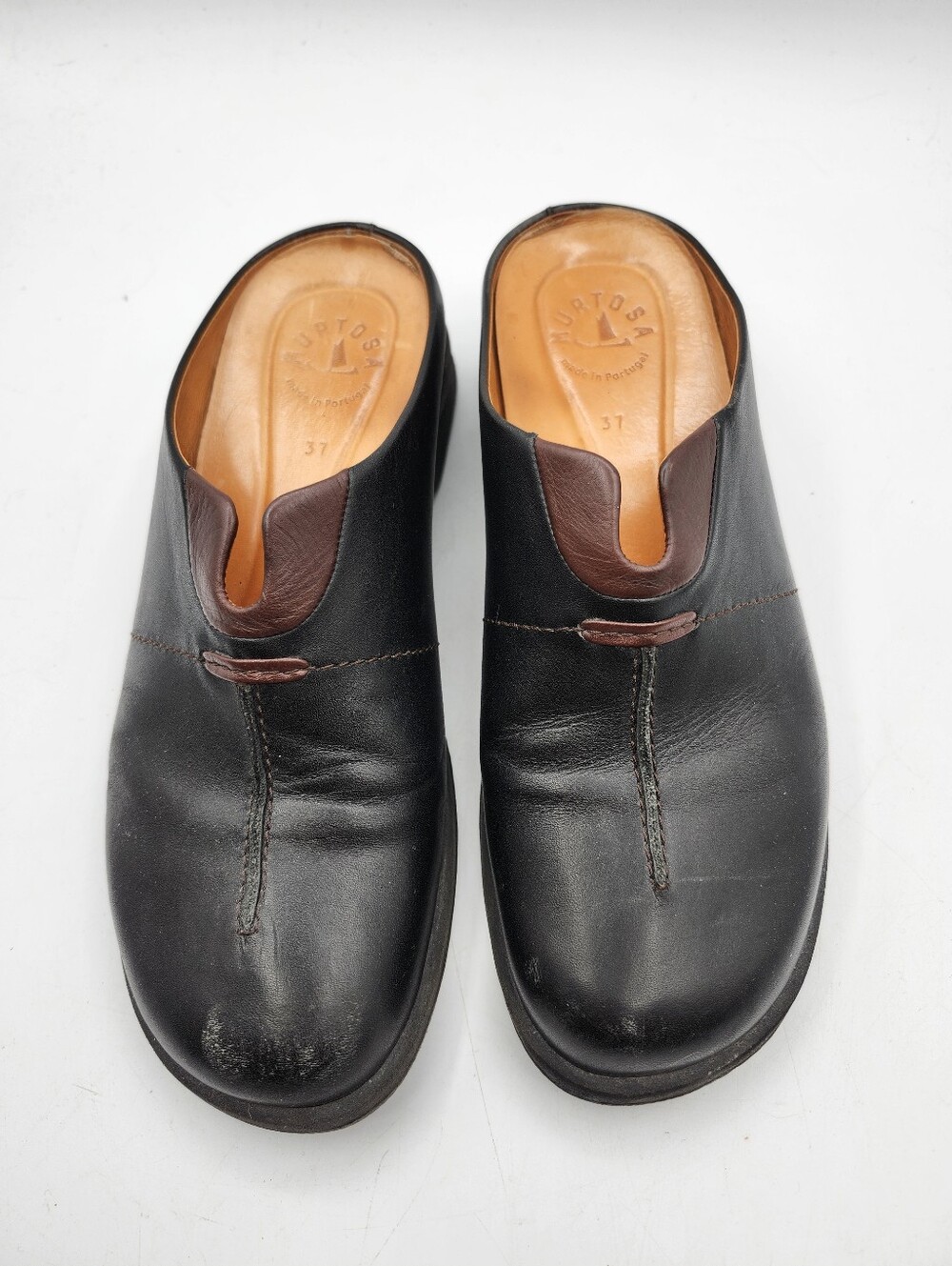 Murtosa Black Leather Slip-On Clogs with Brown Accent